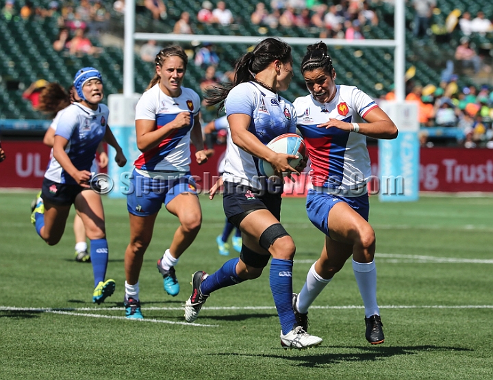 2018RugbySevensFri-04.JPG - Montserrat Amedee (r) of France tackles Yume Okuroda of Japan in the women's first round of the 2018 Rugby World Cup Sevens, July 20-22, 2018, held at AT&T Park, San Francisco, CA. France defeated Japan 33-7.